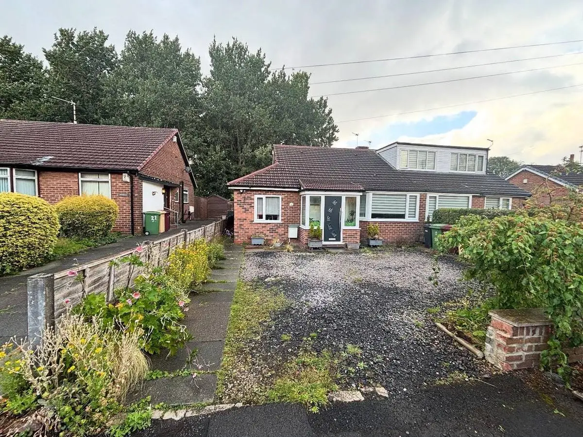 Before: a tired gravel driveway on a semi-detached bungalow
