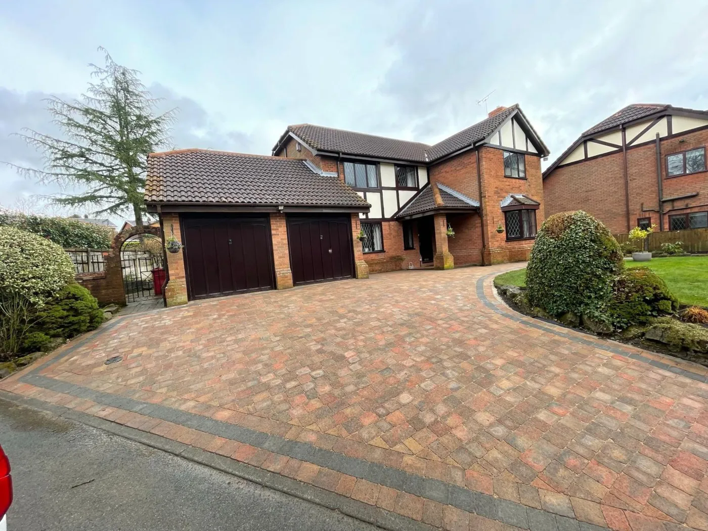 Block paved driveway, detached home