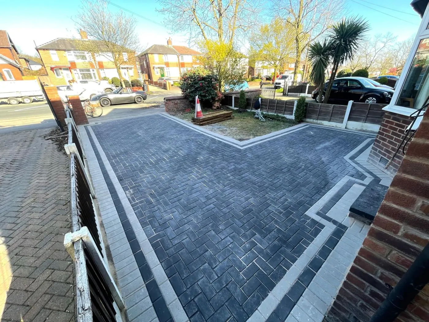 Block paved driveway with a contrasting border