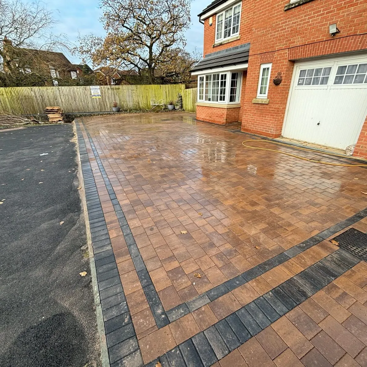 Block paved driveway with a contrasting border
