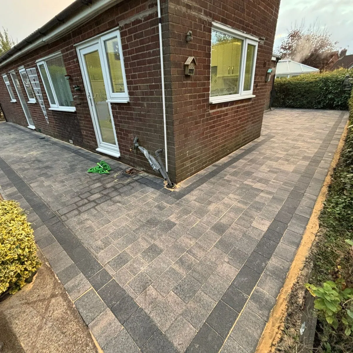 Block paved wraparound driveway