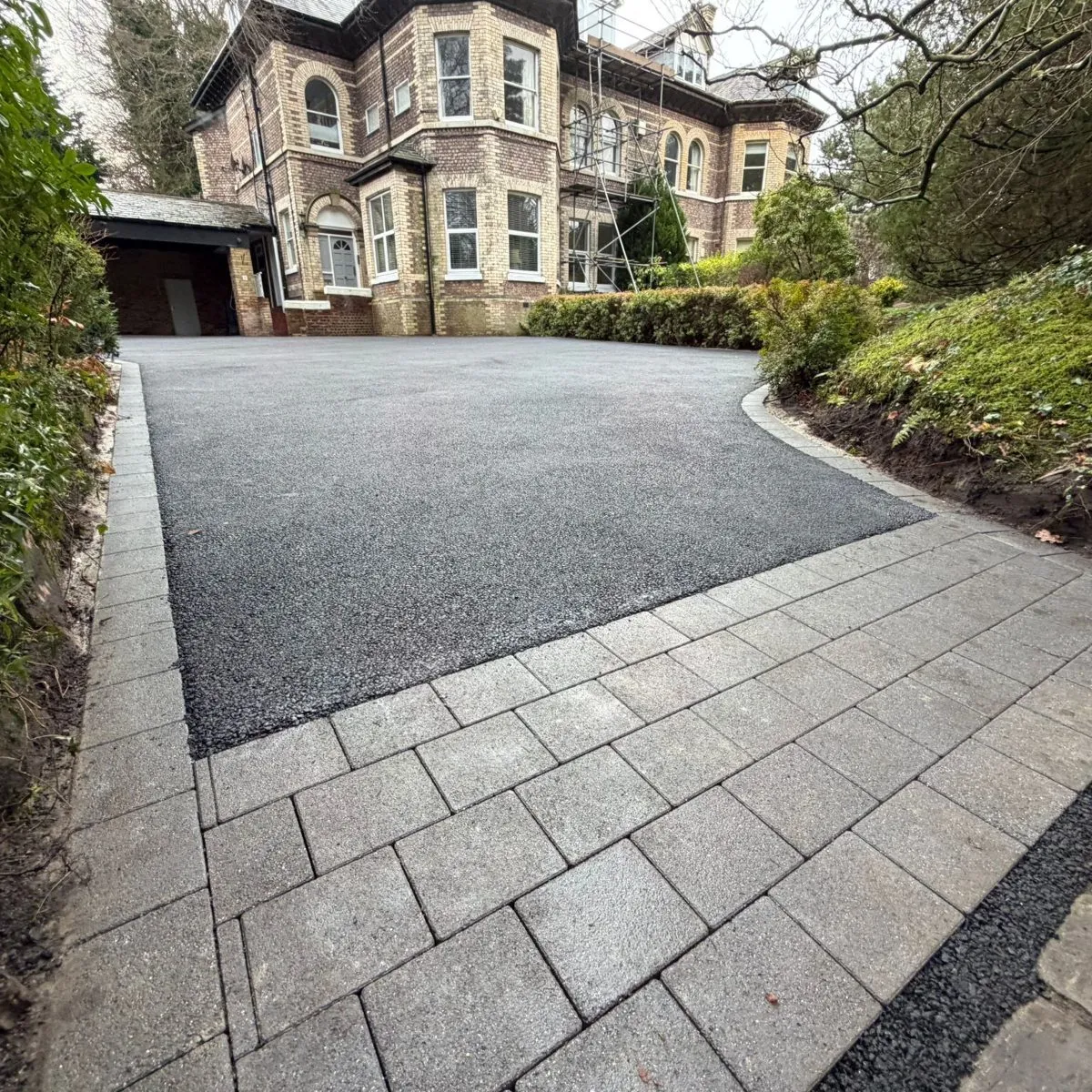 Tarmac driveway with a block-paved apron