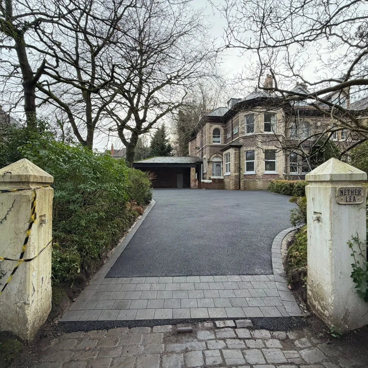 Freshly laid tarmac driveway