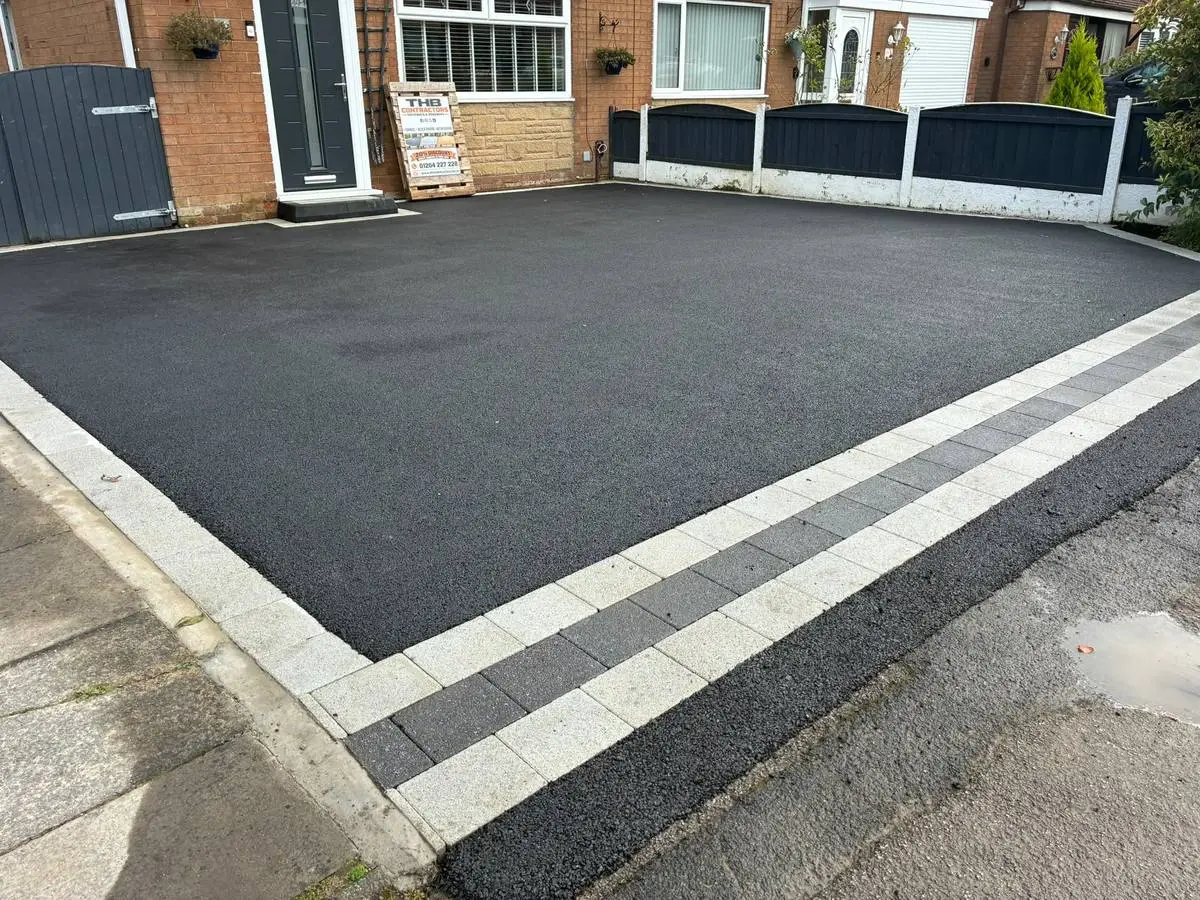 After: tarmac driveway with silver and charcoal block edging